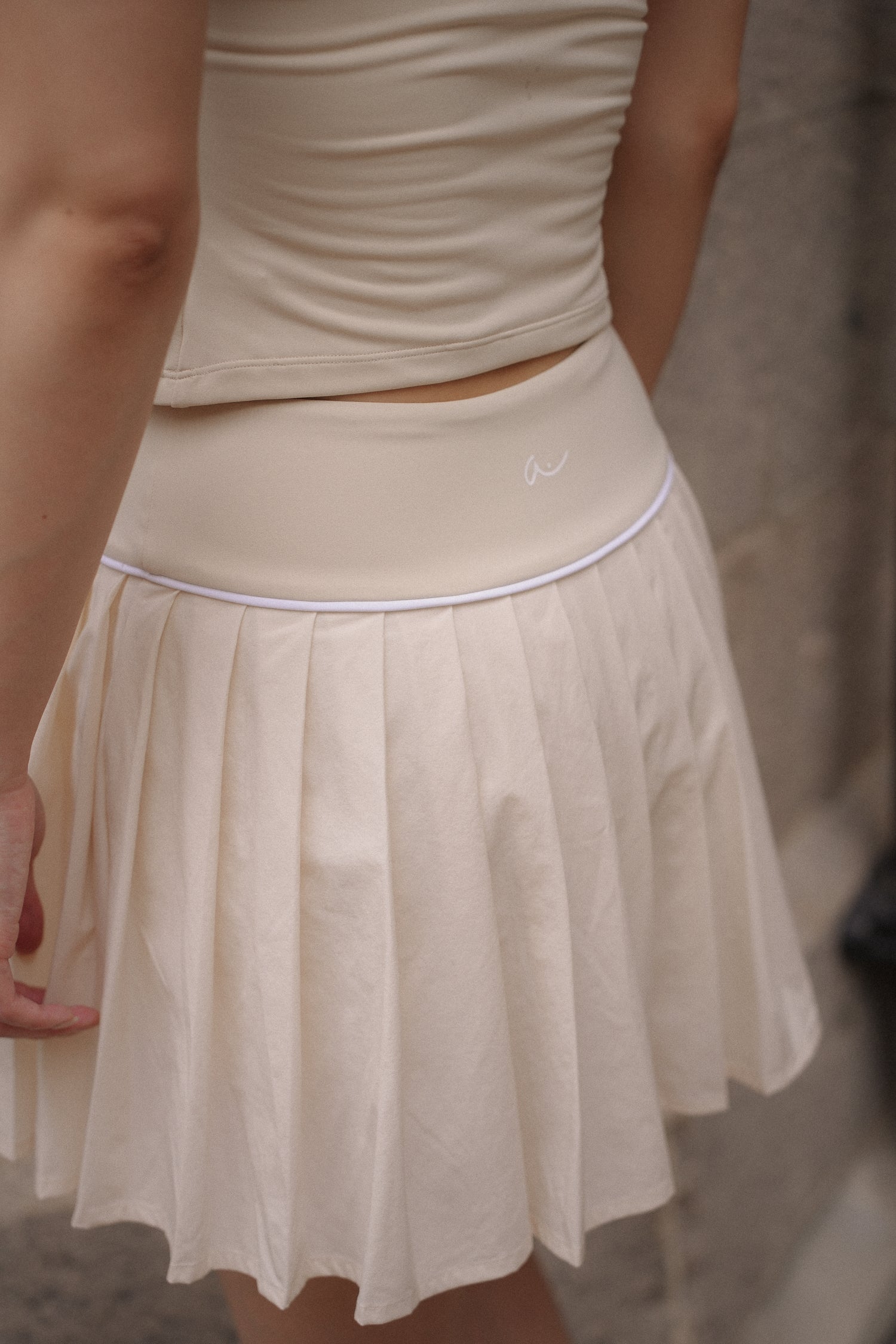 SIDE LINE Pleated Skirt in Ivory